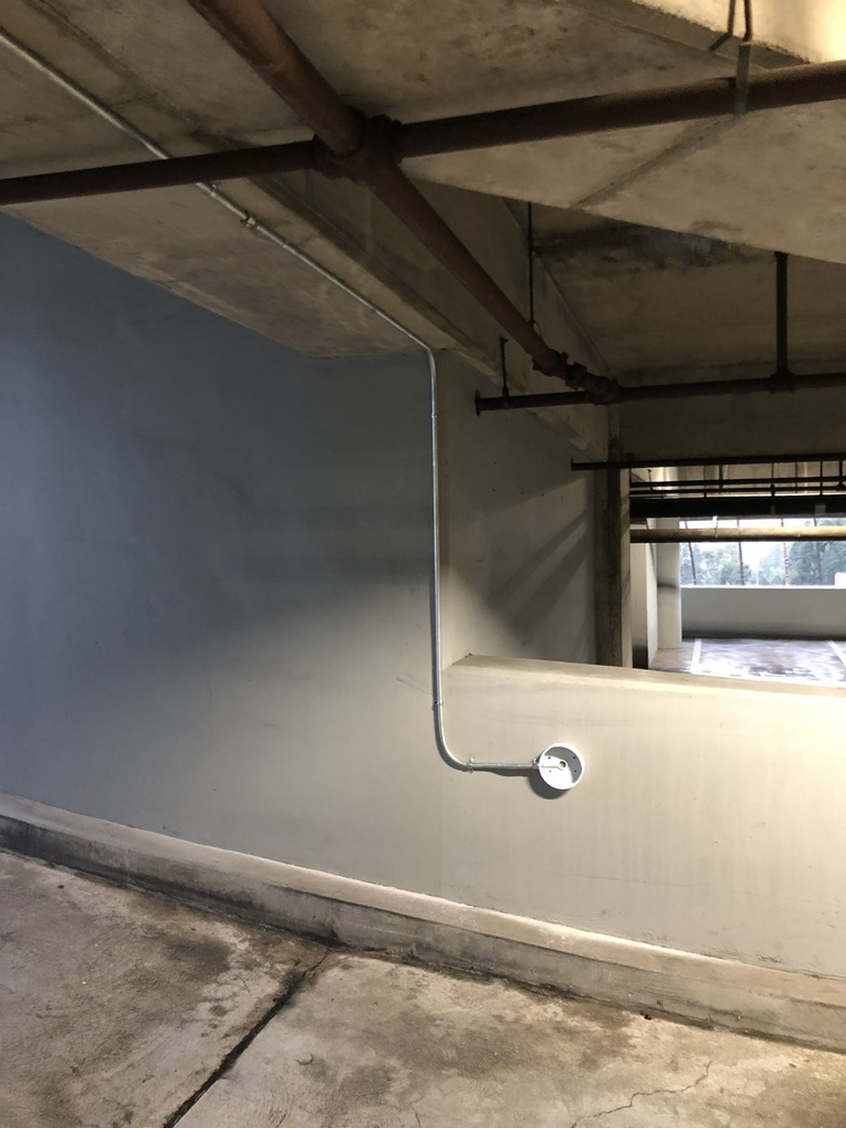 In an underground parking structure, the installation of a single high-definition vandal-resistant dome security camera has been completed on the right-side video surveillance position. This advanced camera system is designed to provide clear, high-resolution footage in low-light environments, ensuring reliable monitoring of the area. The dome design offers 360-degree coverage and tamper-proof construction, making it ideal for high-traffic, vulnerable locations like parking garages. Vandal-resistant features protect against physical damage, while the high-definition lens captures fine details for effective security. This setup enhances overall safety by deterring unauthorized activities and aiding in quick incident resolution through recorded evidence. The installation ensures seamless integration with existing surveillance infrastructure for continuous operation.