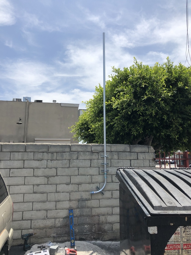 The initial stage in installing a bullet-style security camera on a pole mount involves setting up the EMT pipe. This conduit provides a secure and organized pathway for wiring, protecting cables from environmental damage and ensuring a stable mount. Begin by selecting the appropriate length and diameter of EMT pipe based on the pole's height and camera positioning needs—typically 1/2-inch or 3/4-inch for standard security setups. Measure and cut the pipe to fit precisely, using a hacksaw or pipe cutter for clean edges. Secure the pipe to the pole with sturdy clamps or brackets spaced every 4-6 feet to prevent sagging or vibration. Once mounted, thread the camera's power and video cables through the pipe, sealing ends with bushings to avoid sharp edges. This preparation step lays a reliable foundation for the camera's effective installation and long-term performance.